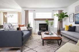 To avoid your space looks boring, you can choose any textured dark gray rug combined with other colors. Dark Gray Sofa On Moroccan Wool Rug Transitional Living Room