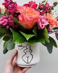 Varieties of green and blooming potted plants, cut flowers and seasonal wreaths seem secondary to a large collection of plastic plants. Ben White Florist Home Facebook