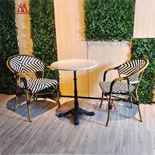 At last a practical piece of garden furniture i will use daily weather permiting nice to have the table between as you always need somewhere to put cups or glasses books etc, and equiped to take your parasol' brilliant, love it. China Wholesale Commercial Garden Aluminum Frame Dining Plastic Rattan Wicker Stackable Chair Bistro Hotel Patio Cafe Armrest Cane Chairs And Table Factory And Suppliers Sun Master