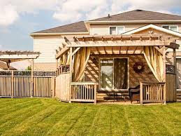 Attaching a pergola to a house can save a bit of space while providing the support the structure needs. 6 Best Pergola Designs Ideas And Pictures Of Pergolas