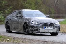 Bmw, 2022 model olarak lanse edeceği elektrik motorlu aracı i4'ün seri üretime geçecek halinin genel tasarımını paylaştı. 2022 Bmw 4 Series Gran Coupe Shows Its Face