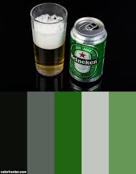 Niederlandisches Heineken Bier Aus Der Offenen Dose Neben Einem Gefullten Bierglas Vor Schwarzem Hintergrund Color Scheme From Colo Lager Beer Beer Glassware