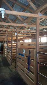 Homemade Box Stalls Made With 2 X 8 S And 4 X 4 S Cattle Barn Barn Stalls Horse Shelter