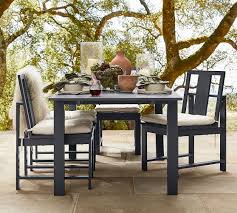Clear glass outdoor dining tables also open up the space with their transparent image. Indio 60 Metal Extending Dining Table Slate Pottery Barn