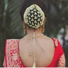 There are many indian women who love add a touch of festivity and feminine appeal to your hair by adorning your textured, messy updo with fresh jasmine gajra. Gajra Hairstyles For Your Wedding What Is Your Favorite Elan