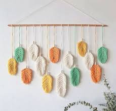 In medieval times, tapestries and large fabric wall hangings insulated stone buildings and cut down on the chilly drafts. China Hand Woven Macrame Wall Hanging Feather Design Tapestry Wall Decor Boho Chic Tassels Decoration Ornaments For Home Decor Apartment Living Room Bedroom Decor China Leaf Wall Hanging And Wall Hanging