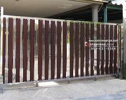 รูปภาพประตูรางโค้งแบบบานเปิด