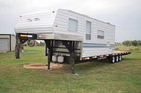 The gravity tilt bed has a damper cylinder for smooth tilting action. 8 Gooseneck Campers Ideas Truck Camper Camping Trailer Toy Hauler