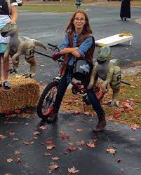 Brooklynn As Owen Grady Chris Pratt S Character From Jurassic World Complete With Her Own Motorcycle And Owen Grady Costume Halloween Costumes Cool Costumes