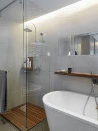 To configure a full, modern bathroom in a footprint of this size, i the best way to maximize shower space in a small bathroom is to use a tiled shower that can be customized to the available space. Small Glass Shower In Corner Of Modern Bathroom Stock Photo Dissolve