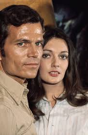Patrick Wayne & Sarah Douglas in "The People that Time Forgot" (1977)