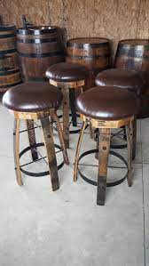 Wine rack, desks, dressers, drawers, entertainment units, futons Whiskey Barrel Stave Bar Stools With Cushioned Swivel Seats Etsy In 2021 Bar Stools Barrel Furniture Wine Barrel Furniture