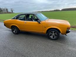 Image result for Tan 1977 Colt