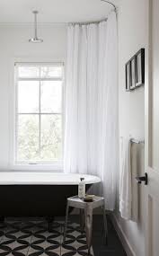 Airy bathroom with white silver clawfoot bath tub. 40 Refined Clawfoot Bathtubs For Elegant Bathrooms Digsdigs