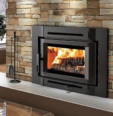 A wood burning fireplace insert creates a cozy atmosphere, is traditional, blends into the room and doesn't require a gas line. Wood Burning Fireplace Inserts Wood Burning Fireplace Insert Installations Wood Burning Fireplace Inserts Fireplace Inserts Fireplace Insert Installation