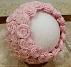 I would place the flower on the glue, then secure by pushing in the pointed end of the flower. Diy Crepe Paper Flower Kissing Ball A Wonderful Thought