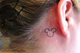 Here is the mickey mouse head outline i would like you to use: Mickey Mouse Tattoo 1 Walt Disney