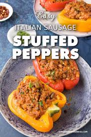 Easy Italian Sausage Stuffed Peppers A Recipe For Flavorful Bell Peppers That Are Stuffed With A Stuffed Peppers Italian Sausage Recipes Sausage And Peppers