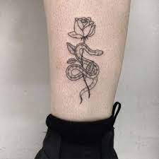 Small snake in flowers tattoo. Tattoo Ideas Tattoos Trendy Tattoos Body Art Tattoos