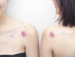 Three simple flower tattoos that look incredible on the side of the body. 60 Amazing Best Friend Tattoos For Bffs Tattooblend