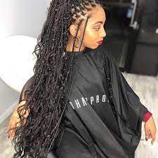 A simple side fishtails braid combined with a messy high ponytail on jet black hair create the simplest yet elegant hairstyle. Boho Bohemian Goddess Box Braids Braids With Curls Braided Hairstyles Curly Hair Styles