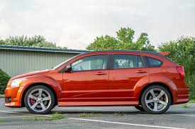 Image result for Sunburst Orange 2009 Caliber