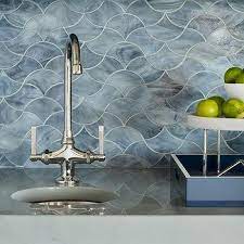 Wave tiles can be used to accentuate a kitchen or bathroom backsplash, bathroom floor, shower wall, or shower pan. Blue Marble Wave Pattern Backsplash Tiles Design Ideas