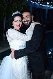 سمية الخشاب وأحمد سعد يلتقطان الصور التذكارية مع أهلهما. Ø±ÙŠÙ… Ø§Ù„Ø¨Ø§Ø±ÙˆØ¯ÙŠ ØªØ¹Ù„ Ù‚ Ø¹Ù„Ù‰ ØµÙˆØ± Ø²ÙØ§Ù Ø³Ù…ÙŠØ© Ø§Ù„Ø®Ø´Ø§Ø¨ ÙˆØ£Ø­Ù…Ø¯ Ø³Ø¹Ø¯ Ù…Ø¬Ù„Ø© Ø§Ù„Ø¬Ø±Ø³