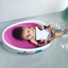 When bath time is over, an attached hook lets you hang it. Amazon Com Angelcare Soft Touch Mini Baby Bath Support Aqua Baby