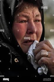 At the funeral service of his mother hi-res stock photography and images