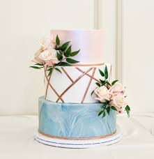 Anything but traditional white on white decor, round tiers cream, navy blue and silver. Wedding Cakes Blue Lace Cakes