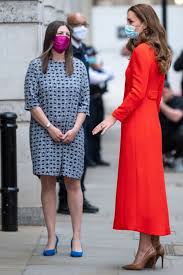 Launching on the 7 may 2021, its publication will mark one year since hrh the duchess of. Kate Middleton Wears Pleated Skirt Red Coat Tall Heels To Hide Book Footwear News