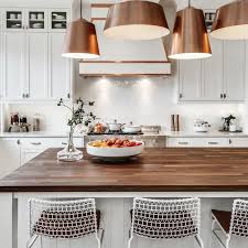 Copper And Wood Accents Bring A Warm And Cozy Feel To This Beautiful White Kitchen Great Look T Kitchen Remodel Kitchen Cabinet Design Kitchen Cabinets