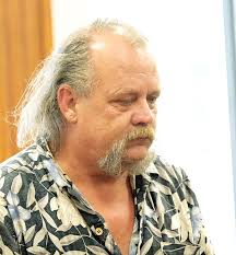 Troy man charged after airport fracas