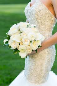 A unique christmas wedding bouquet of green and tiny red christmas ornaments is a very creative idea. Timeless White And Neutral Bridal Bouquet Avant Gardenia