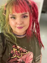 What merchandise item should I gift to someone at the Melanie Martinez  concert?