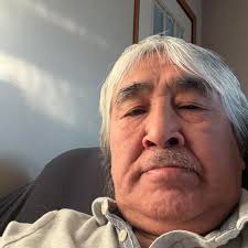 My shadow blends into a piece of driftwood and "walks" becoming a ghostly  figure in the middle of the Chatanika River north of Fairbanks.