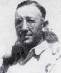 This picture was taken at the Orville Holeman country home about 1910. From  left to right, back row, Edward Johnson and Orville Adkisson. Middle row,  Seth Adkisson, Grace Adkisson, Jacob Adkisson, Carrie