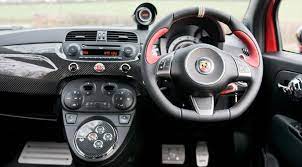 The new abarth 695 tributo ferrari is distinguished by a number of stylistic changes, but more importantly by substantial modifications developed by abarth and ferrari engineers. Abarth 695 Tributo Ferrari 2011 Review Car Magazine
