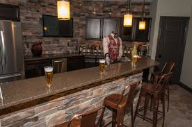 However, even if you don't have an unlimited budget, you don't have to leave your basement unfinished and unused. Fischer Homes Wheatland Finished Basement Bar Area Finished Basement Bars Finishing Basement Basement Bar Plans