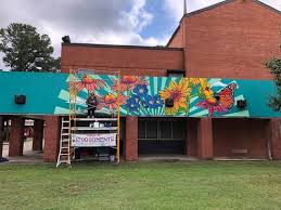 Creative Force Behind Mural Project at Conway Human Development Center is a  Hendrix Alum