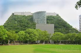 Photos Japan S Acros Building Is A Mountainous Green Roofed Pyramid Planted With Trees Green Roof System Green Roof Green Architecture