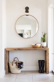 Rustic Meets Modern Front Entrance Design With Console Table And Round Mirror Modernhomedecorinteriorde Front Entrance Decor Home Decor Home Decor Inspiration