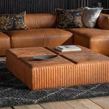 And it may not seem like you are losing a lot of space, but you actually are. Marcel Tan Leather Ottoman Coffee Table Interiors Online