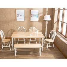 Made of solid pine, this farmhouse table will bring character and depth to any dining room. The 8 Best Farmhouse Dining Tables Of 2021