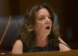 Suspended police chief also faces suit over bias claim in pit bull attack