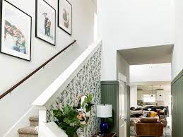 This way you can rest easy knowing that everything lines up like a grid or like streets on a map + that your pictures are perfectly centered on your staircase.phew! How To Hang Photos On Your Staircase Love Renovations