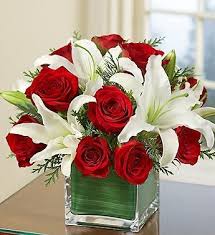 Roses And Lilies Flower Arrangement Christmas Floral Arrangements Christmas Flowers Flower Arrangements