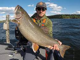 Mike Richards With A Sunset Country Lake Trout Lake Trout Fishing Trout Fishing Lake Fishing