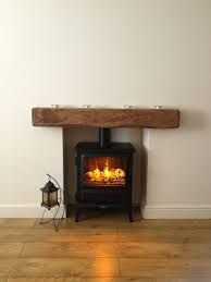 pin by helen lane on decorating ideas oak beam fireplace wood burning stoves living room bunnings steel shelving units